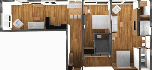 a floor plan of a small apartment with wood at Appartement KroneLiving in Tirolo