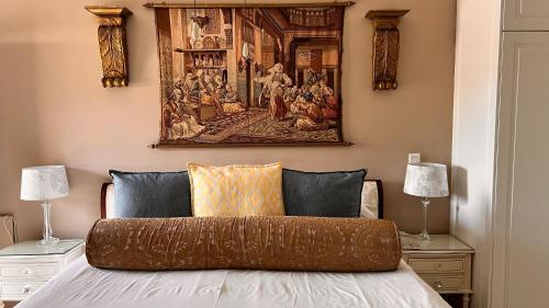 Ένα ή περισσότερα κρεβάτια σε δωμάτιο στο Amber Guest Lodge