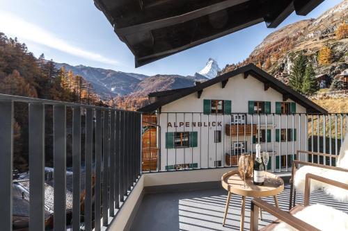 a balcony with a view of a building at Elfi - luxury mountain bijou by Inspiringplaces Zermatt in Zermatt