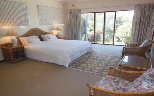 En eller flere senge i et værelse på 115 Nkwazi Drive