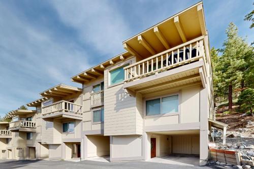 a large apartment building with balconies at Towering Pine in Incline in Incline Village