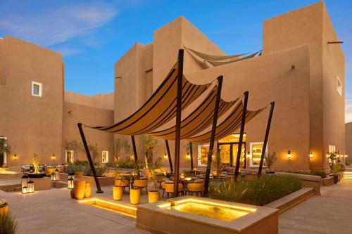 a hotel courtyard with a tent in front of a building at Bab Samhan, a Luxury Collection Hotel, Diriyah in Riyadh