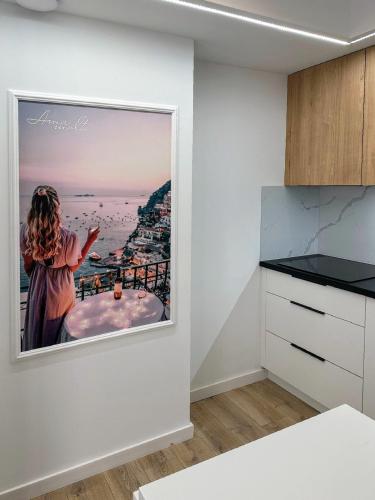 Η κουζίνα ή μικρή κουζίνα στο AmaMolto Select - włoskie apartamenty, bezpłatny parking