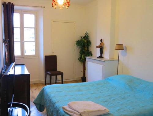 Una cama o camas en una habitación de Viva Riviera - 10 Rue Commandant André
