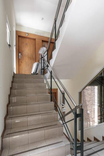 a staircase in a house with metal railings at Dorrego Premium in Rosario