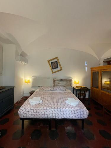 Een bed of bedden in een kamer bij il Plancton