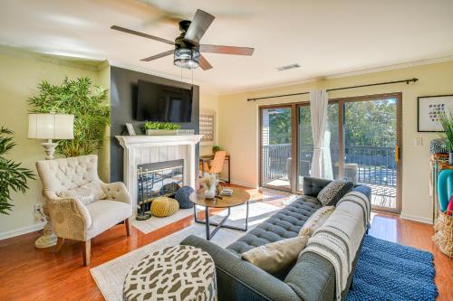a living room with a couch and a fireplace at Hot Springs Condo on Lake Hamilton with Views! in Hot Springs