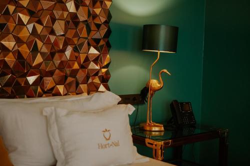 Hotel Boutique Hort de Nalにあるベッド