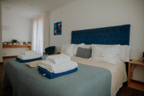 Hotel Boutique Hort de Nalにあるベッド