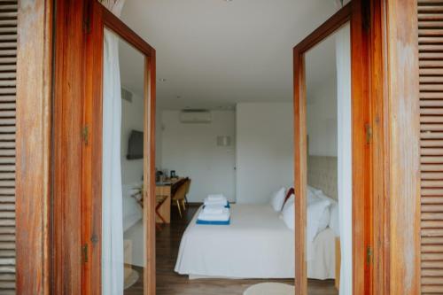 Hotel Boutique Hort de Nalにあるベッド