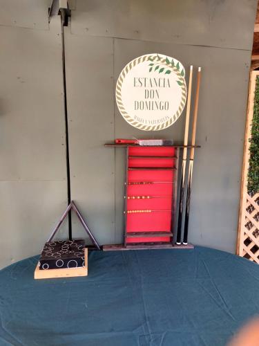 a stage with two red drawers and a sign at Estancia Don Domingo in Hualañé