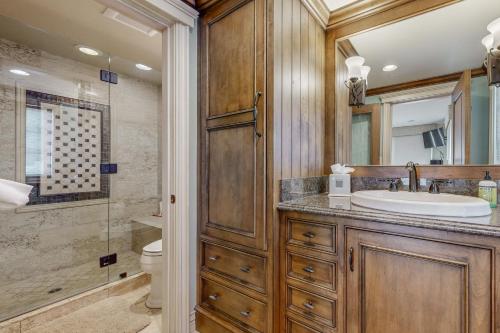 a bathroom with a sink and a toilet at Breakers Way Adventure in Carpinteria