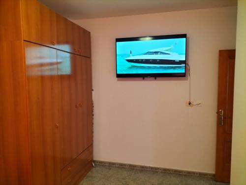 Televisyen dan/atau pusat hiburan di Casa RITI Las Eras