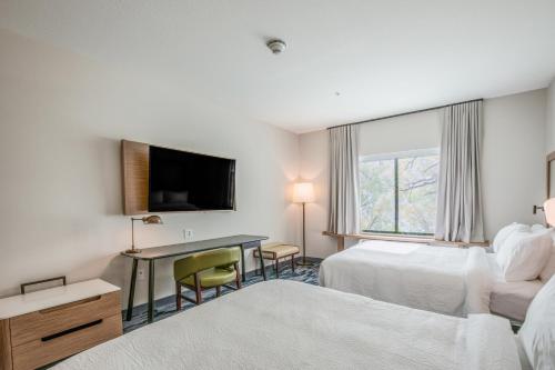 Ένα ή περισσότερα κρεβάτια σε δωμάτιο στο Fairfield Inn & Suites Whitewater