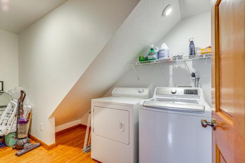 a white washer and dryer in a laundry room at Walk to Beach and Relax by Pool St Augustine Home in Saint Augustine