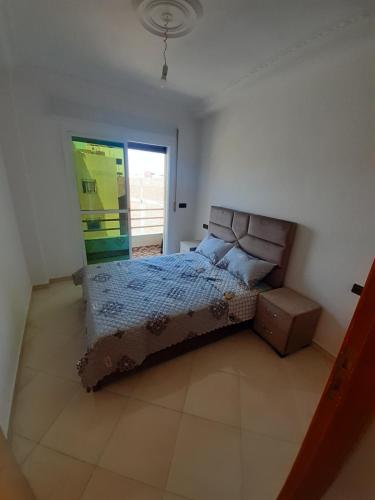 Postel nebo postele na pokoji v ubytování Appartement à Martil 10 min de la plage
