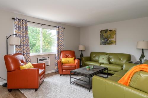 a living room with a couch and two chairs at Midcentury Modern 2br Comfort Near The Greene! in Kettering