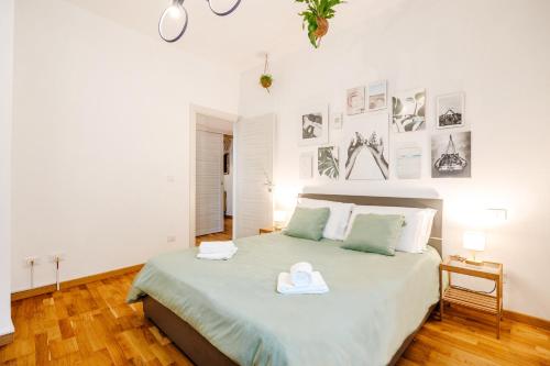 Ένα ή περισσότερα κρεβάτια σε δωμάτιο στο DiffeRent Home - Parcheggio privato