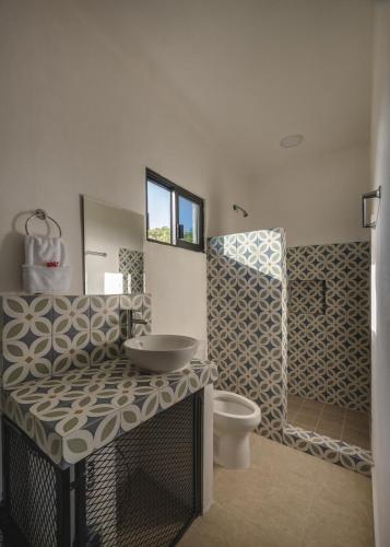 Bagno di Hotel Kuxtal
