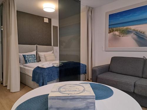 Posteľ alebo postele v izbe v ubytovaní MK Apartamenty Morski