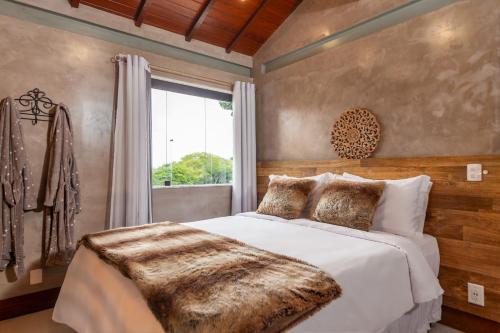 Postel nebo postele na pokoji v ubytování Gringos Boutique Hotel
