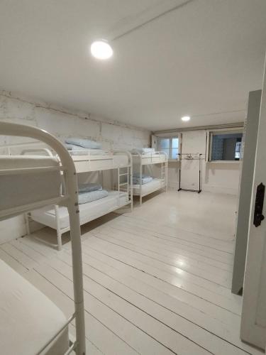 Ένα ή περισσότερα κρεβάτια σε δωμάτιο στο O2 Hostel