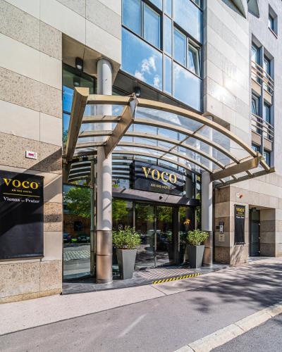 a building with a vogoco sign in front of it at voco Vienna Prater by IHG in Vienna
