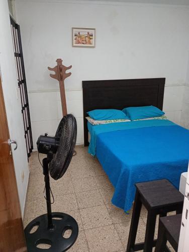 Ένα ή περισσότερα κρεβάτια σε δωμάτιο στο Aloja turistas