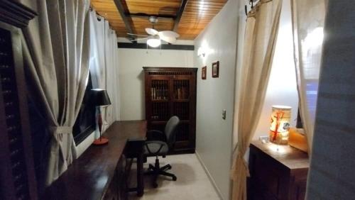 Телевизор и/или развлекательный центр в Amplio y Hermoso Apartamento
