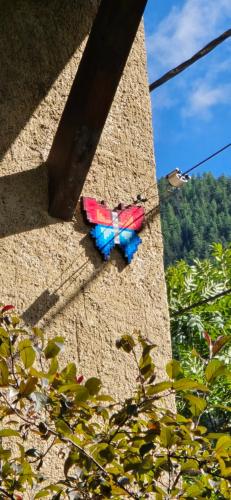 two ties are on the side of a building at Papillon 05 - Wellness in Briançon