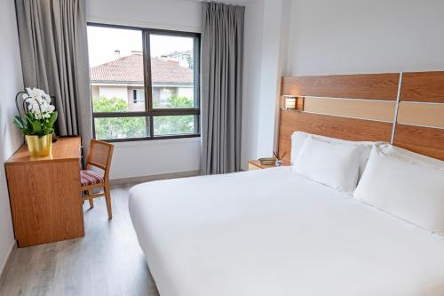 Postel nebo postele na pokoji v ubytování Hotel Faranda Los Tilos, Ascend Hotel Collection