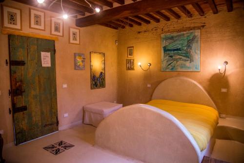 Katil atau katil-katil dalam bilik di Casa Del Sole