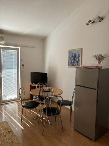Μια τηλεόραση ή/και κέντρο ψυχαγωγίας στο Apartment Sumpetar 2808b
