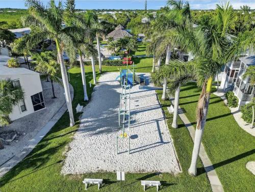 an aerial view of a playground with palm trees at Keys Relaxing Getaway-Kawama K5 in Key Largo