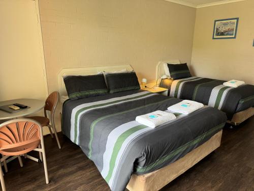 Postel nebo postele na pokoji v ubytování Ulladulla Harbour Motel
