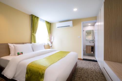 Katil atau katil-katil dalam bilik di Hotel Kuretakeso Thailand Sriracha - SHA Extra Plus