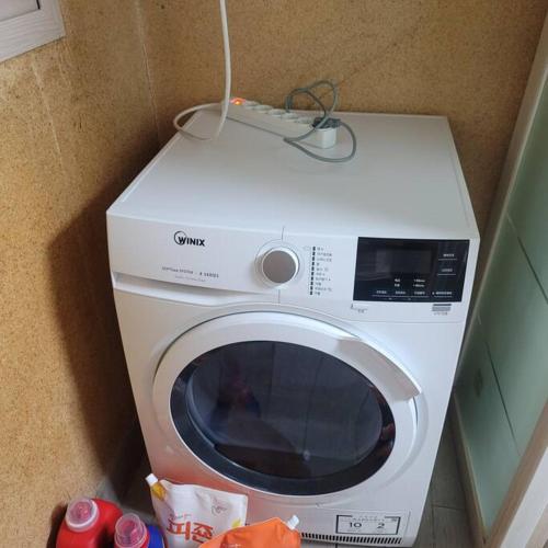 a white microwave with a remote on top of it at Incheon Sungeuidong happy stay for 10 pax in Incheon
