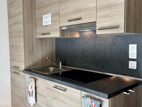 Photo de la galerie de l'établissement Appartement rénové 6 pers au cœur de Valfréjus - FR-1-265-373, à Modane