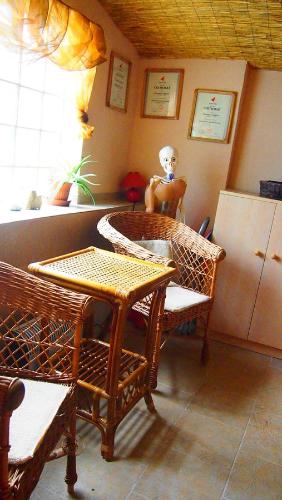 a dining room with a table and chairs and a table and a tableablish at Private Světluška in Poběžovice
