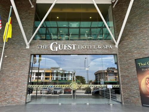 a guest hotel and spa sign on the front of a building at The Guest Hotel & Spa in Port Dickson