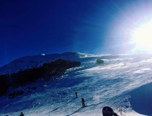 a group of people skiing down a snow covered slope at Ski Lift Access - Modern 3BR Chalet - Fireplace in Mount Buller