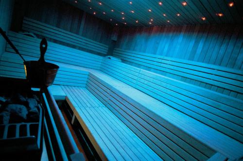 a stage with a bucket in a blue room at Maistra Select All Suite Island Hotel Istra in Rovinj
