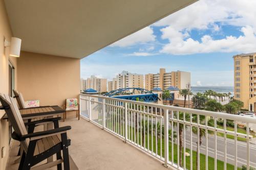 a balcony with a view of a roller coaster at Crystal Tower 409 in Gulf Shores