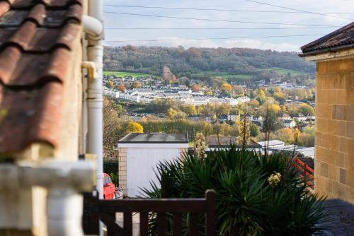 a view of a city from a house balcony at Haven in Bath