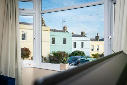 a window with a view of a street at Haven in Bath