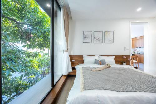 Ένα ή περισσότερα κρεβάτια σε δωμάτιο στο Urchin Apartment