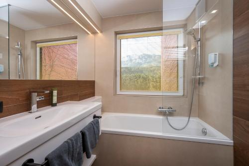 Kúpeľňa v ubytovaní Bliem's Familienhotel