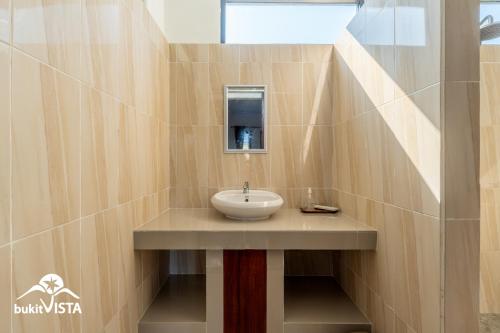 Et badeværelse på Kubu BK by Bukit Vista