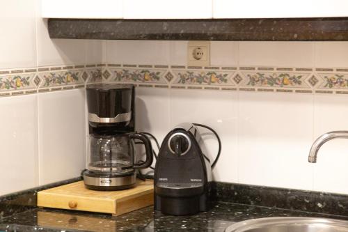 a coffee maker sitting on a counter in a kitchen at Señorío de Ves in Casas de Ves