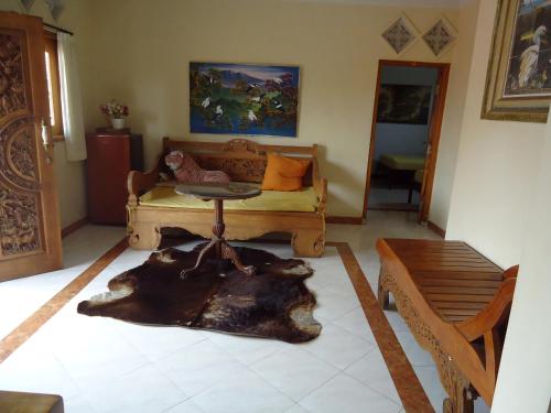 Ένα ή περισσότερα κρεβάτια σε δωμάτιο στο The Reinhold Guesthouse Bali